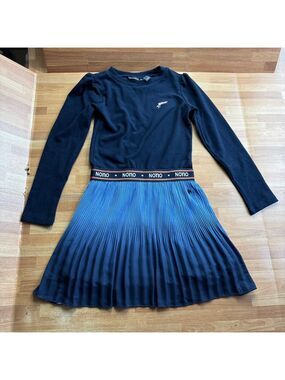 Nono long-sleeved dress with a dark blue top and pleated skirt size 7/8